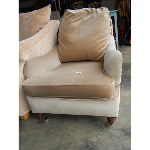 601 - An oyster arm chair in good condition.