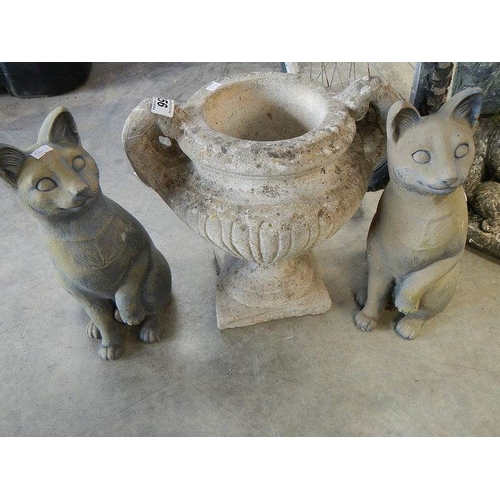 656 - A concrete bird bath, urn and 2 plastic cats.