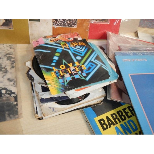 683 - '22 Top Sleeping Bag' picture disc and a quantity of records.