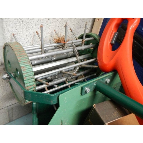 728 - A quantity of garden tools, strimmer, hedge cutter, chain saw etc.,