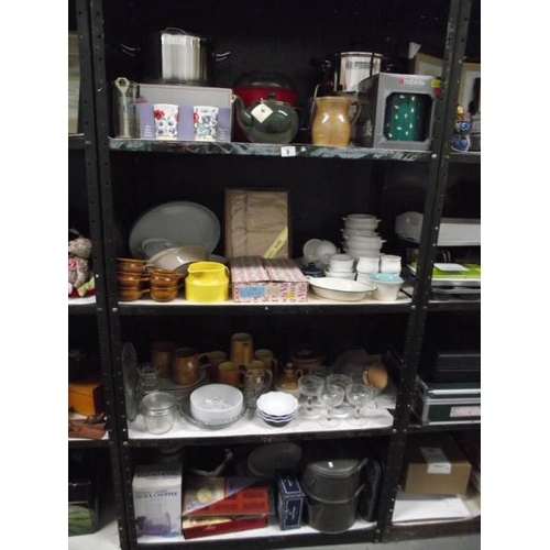 9 - 4 shelves of kitchenware including some new items.