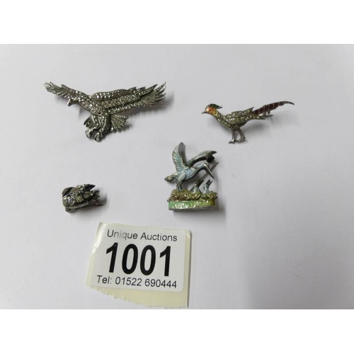 1001 - 4 silver bird brooches circa 1940/50's being eagle, enamelled and stone set pheasant, a swan and a m... 