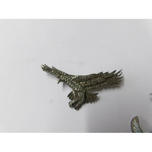 1001 - 4 silver bird brooches circa 1940/50's being eagle, enamelled and stone set pheasant, a swan and a m... 