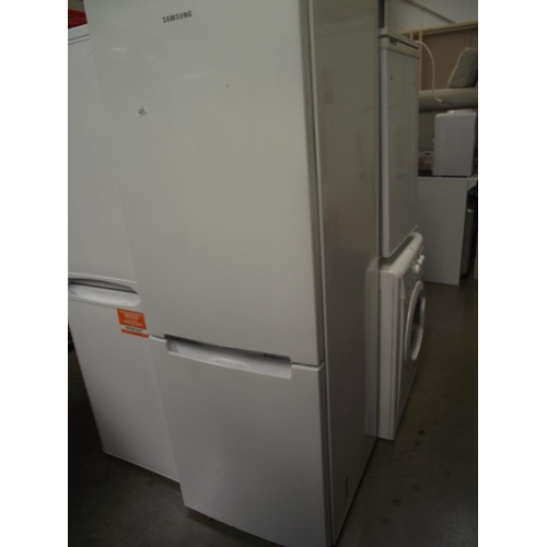 101 - A Samsung fridge freezer (some dents to door)