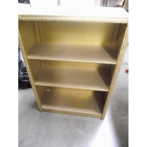 47 - A gold painted Lloyd Loom style shelf unit