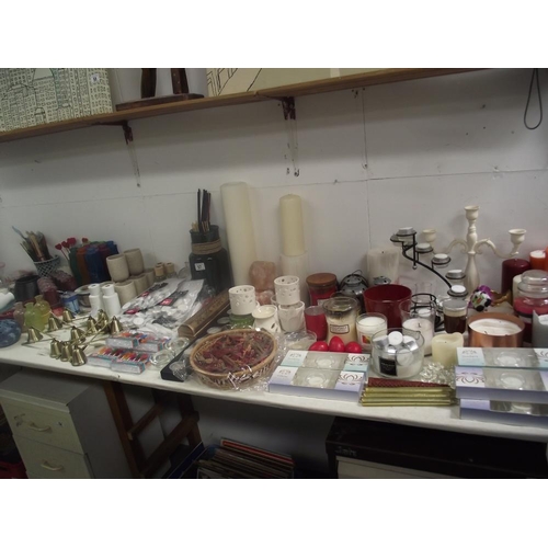 57 - A large lot of candles, candle holders, candle snuffers, tealights etc.