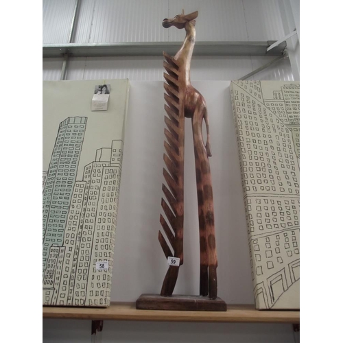 59 - A wooden giraffe cd holder