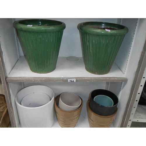 764 - 2 shelves of pots.