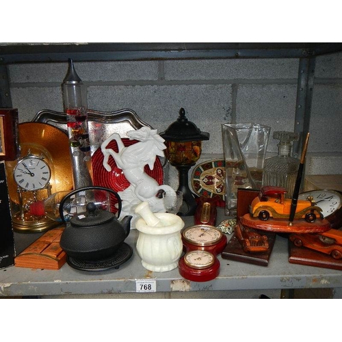 768 - A shelf of interesting items.