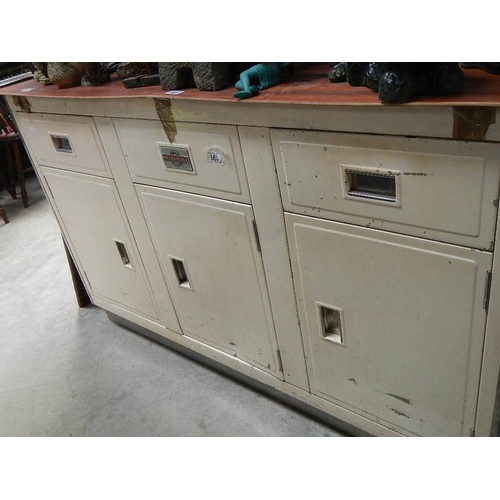 863 - A vintage (circa 1950's) metal kitchen cabinet, missing top.