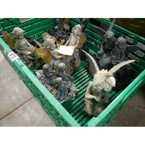 873 - A basket of fairy garden figures.