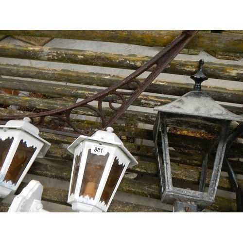 881 - 2 old metal porch lights and 2 others.