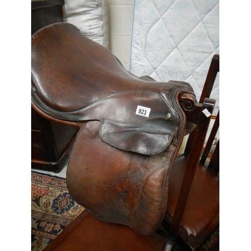 923 - An old leather saddle.