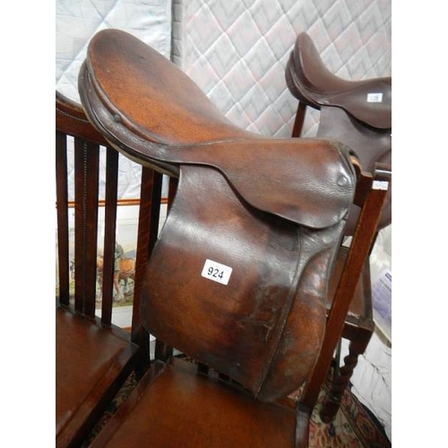 924 - An old leather saddle.