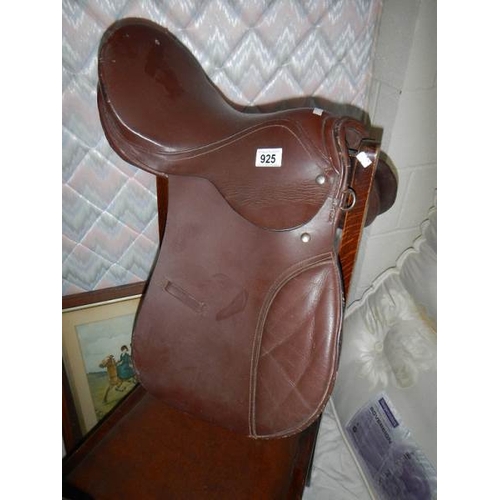 925 - An old leather saddle.