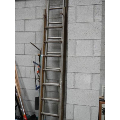 973 - A quantity of wooden ladders.