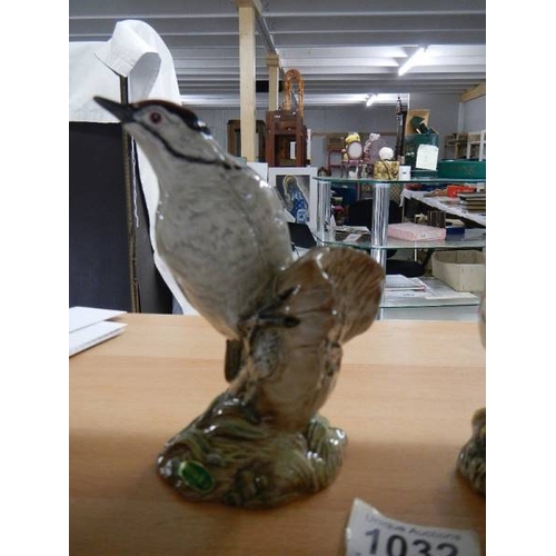 1032 - A Beswick Lesser Spotted Woodpecker, No.2420 (tail has minute flee bite) and a Beswick Owl No.2026.