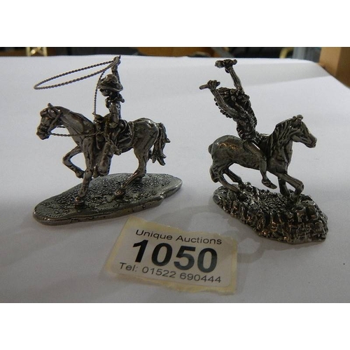 1050 - A white metal cowboy on horse with lasso together with a white metal American Indian on horse, (poss... 