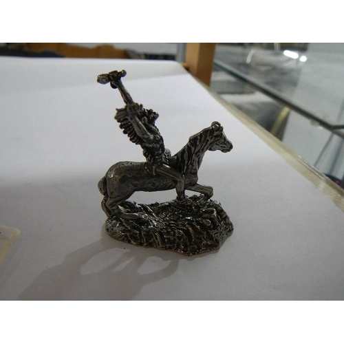 1050 - A white metal cowboy on horse with lasso together with a white metal American Indian on horse, (poss... 