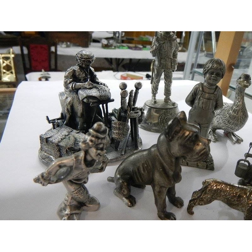 1051 - A mixed lot of metal figures including lace maker,  soldier, dogs, ducks etc.,