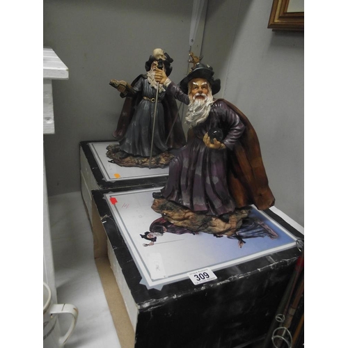 309 - 2 boxed resin Wizard figures