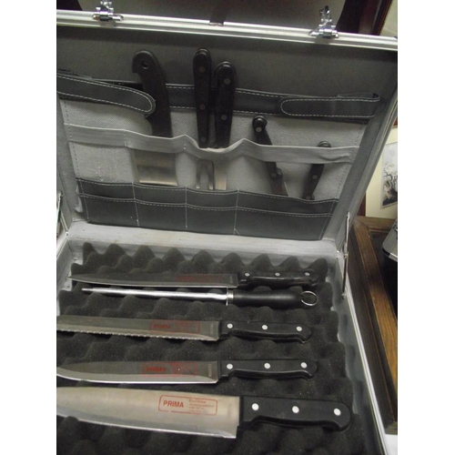 318 - 2 stainless steel cases of chef's Prima knives