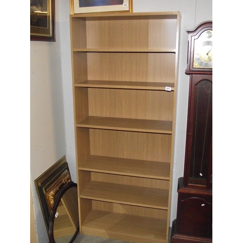 517 - A modern wood effect 6 shelf book case