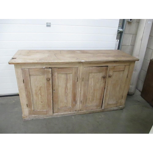 114 - A pine 4 door kitchen sideboard / cabinet