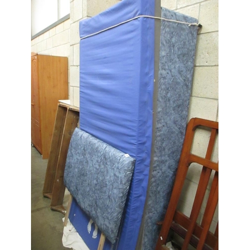 118 - A mottled blue single bed base with matching head board and protected mattress