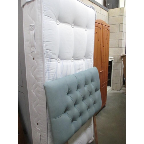 122 - A single divan bad base with mattress and headboard