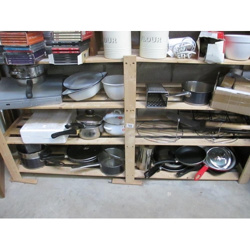 785 - 4 shelves of pots and pans.