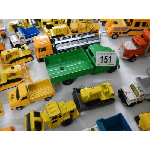 151 - Approximately 75 construction themed die cast vehicles.