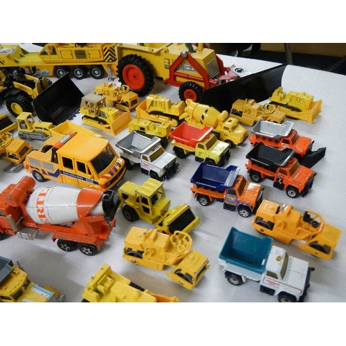 151 - Approximately 75 construction themed die cast vehicles.