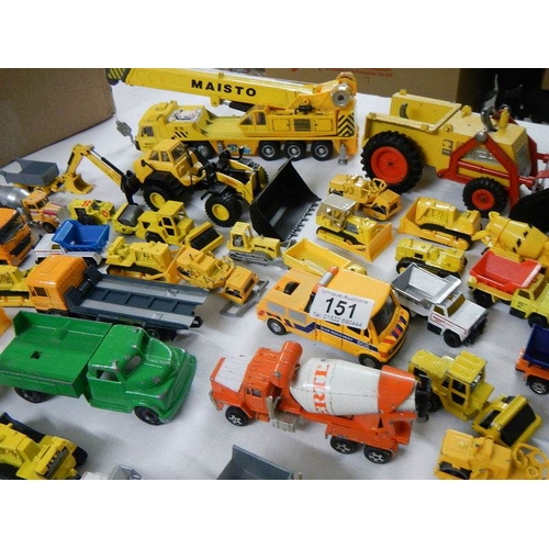 151 - Approximately 75 construction themed die cast vehicles.