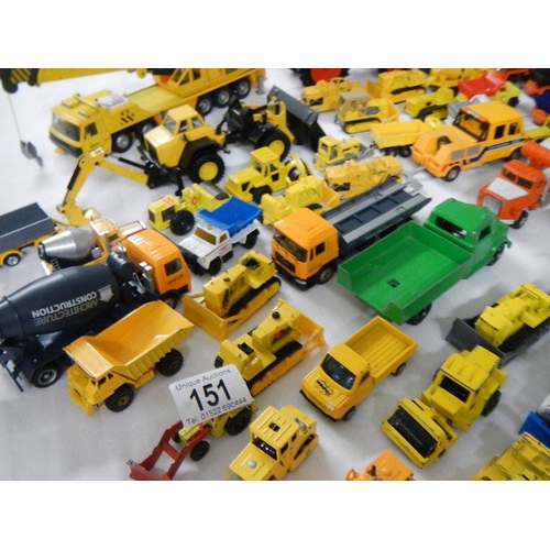 151 - Approximately 75 construction themed die cast vehicles.