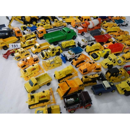 151 - Approximately 75 construction themed die cast vehicles.