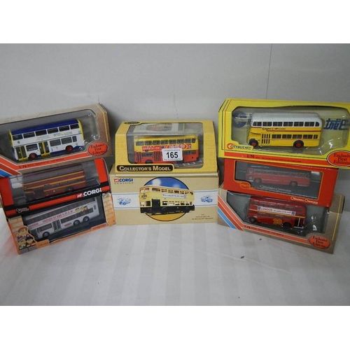 165 - Eight die cast Corgi model buses.