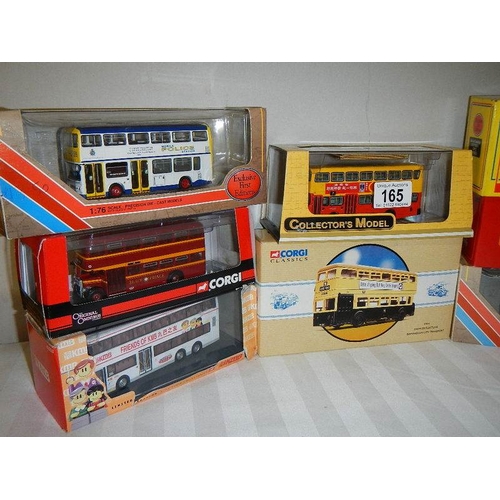 165 - Eight die cast Corgi model buses.