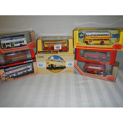 165 - Eight die cast Corgi model buses.