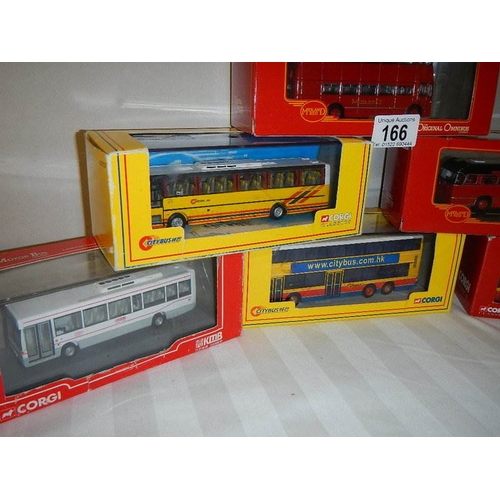 166 - Seven die cast Corgi model buses.