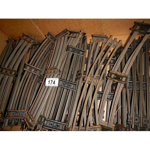 174 - A box containing a quantity of three rail O gauge track.