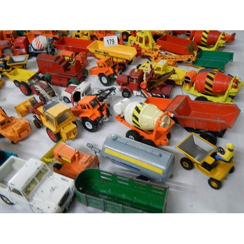 179 - Approximately 68 construction and farming related die cast models.