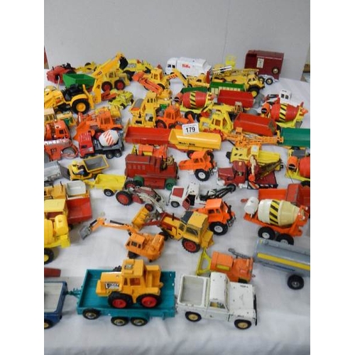 179 - Approximately 68 construction and farming related die cast models.