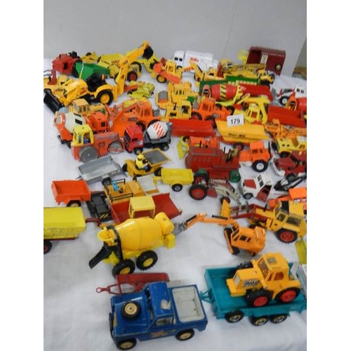 179 - Approximately 68 construction and farming related die cast models.