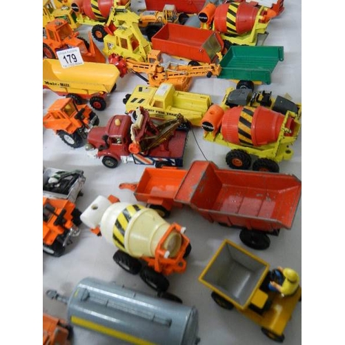 179 - Approximately 68 construction and farming related die cast models.