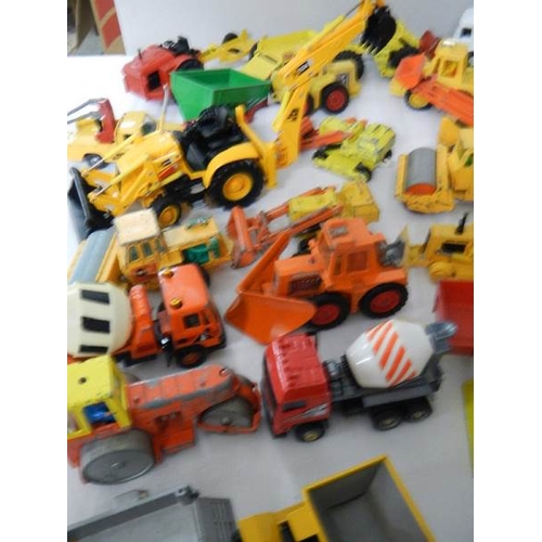 179 - Approximately 68 construction and farming related die cast models.