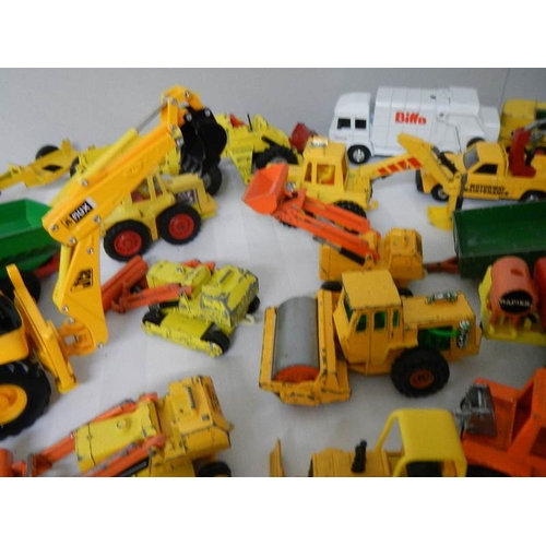 179 - Approximately 68 construction and farming related die cast models.