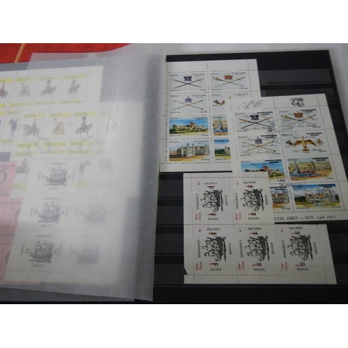 180 - 2 albums of worldwide Cinderella and back of book stamps.