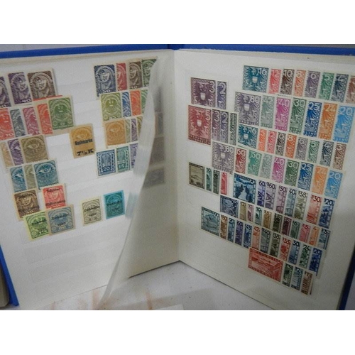 183 - 6 albums of worldwide stamps - early to mid 20th century.