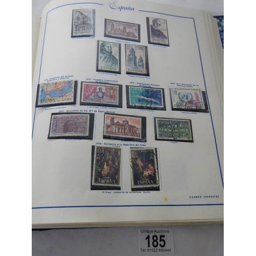 185 - A good collection of Spanish stamps in 5 albums plus reference books.